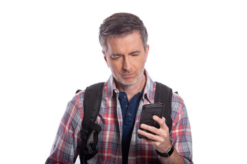 Tourist or traveling hiker unable to get cellphone reception or network.  The man can't make a call or get a rideshare because he has no service or internet. Isolated on a white background.
