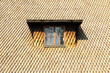 © Alexander_photo - Steep old shingle roof with a window - Background close-up