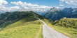 canvas print picture - Panorama eines Mountainbike Trails in den Alpen