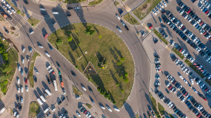 Wall Mural - aerial 4k top view of traffic in a circle