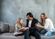 © alphaspirit - Happy little girl play with her mother and father