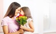 © BillionPhotos.com - Portrait of happy mother and daughter holding