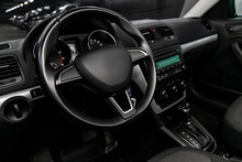 Close-up Of The Dashboard, Speedometer, Tachometer And Steering Wheel, Dashboard. Luxurious Car Interior Details.