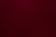 Burgundy Red Felt Texture Abstract Art Background. Solid Color Construction Paper Surface. Copy Space.