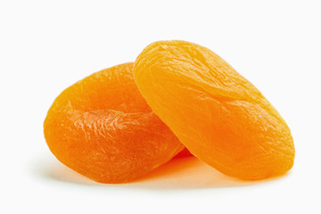 Wall Mural - dried apricots on a white background