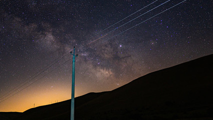 Wall Mural - power line against the night starry sky