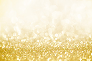 Golden shimmer glitter texture confetti designed background