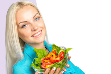 woman portrait eating green salad with tomatoes