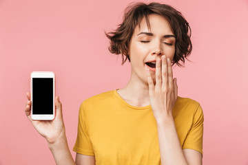 Sleepy background using mobile phone showing display yawning.