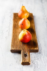 Wall Mural - Fresh bio pears on the grey background