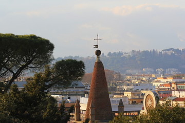 Cityscape of Rome, Italy, a view with tower clock of Basilica of Santa Maria del Popolo