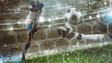 Fototapeta Sport - Goalkeeper catches the ball in the stadium during a football game
