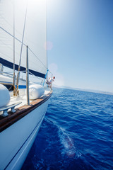 Sailing. Ship yachts with white sails in the open Sea.