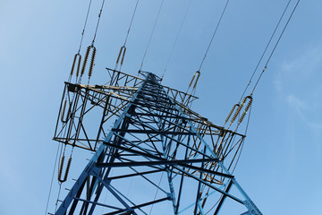 High voltage power line against the sky