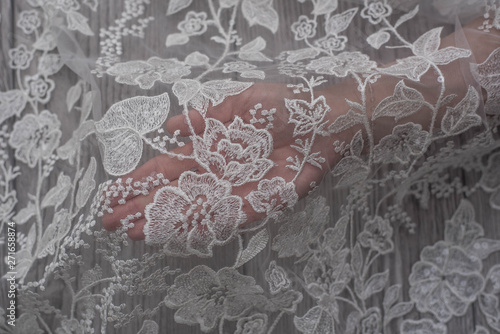 Hand Sewing Beads Pearls To The White Lace Silk Fabric Making A