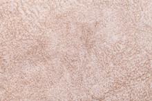 Light Beige Fluffy Background Of Soft, Fleecy Cloth. Texture Of Textile Closeup.