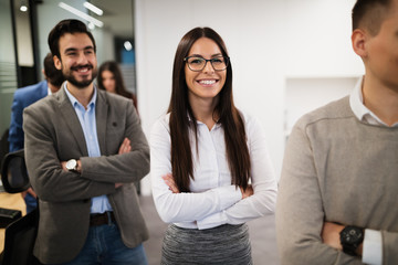 Portrait of business team posing in office