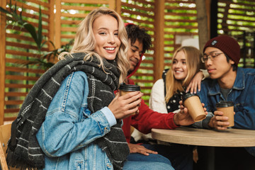 Canvas Print - Happy multhietnic friends hanging out together