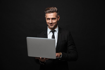 Handsome confident businessman wearing suit