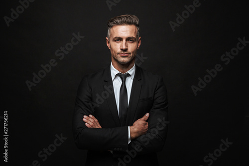 Fotografía Handsome confident businessman wearing suit