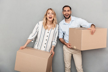 Attractive young couple standing isolated