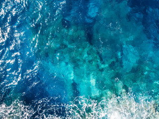 Wall Mural - Raging blue water of open Mediterranean Sea with turquoise bottom. top view