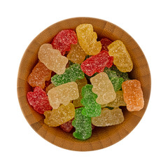 Wall Mural - Bowl of generic sugar coated gummy bears on a white background.