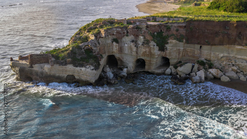 Aerial view of the free beach of the Nerone caves next to the Imperial Villa of Anzio in Italy. Here are the ruins of the emperor\'s villa of ancient Rome.
