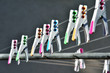 © Gur - Clothespins for hanging the laundry. Colored clothes pegs on the rope.