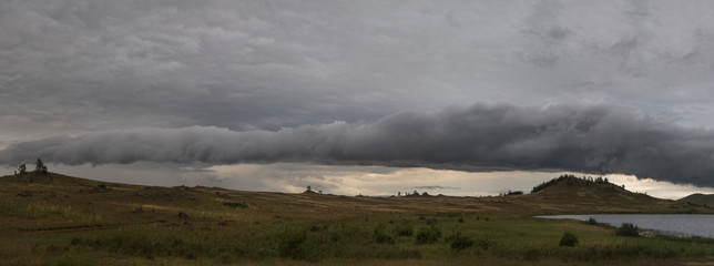 a storm begins and a thunderstorm happens in the mountains of Russia