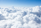 Fototapeta Na sufit - Clouds and sky from airplane window view