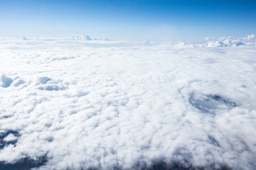 Clouds and sky from airplane window view