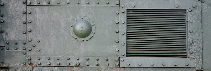 Abstract green industrial metal textured background with rivets and bolts