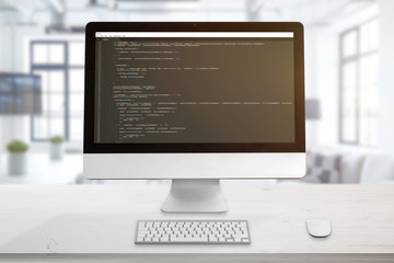 Leinwandbilder - Computer display with code editor. The concept of a developer workplace. The office is in the background.