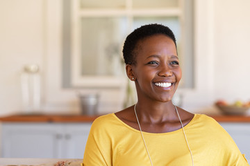 Wall Mural - Mature black woman smiling with hope