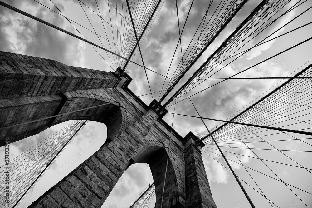 Brooklyn Bridge New York City close up architectural detail in timeless black and white - obrazy, fototapety, plakaty 