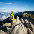 © Summit Art Creations - Epic adventure of hiker do trekking activity in mountain of Northern Japan Alps, Nagano, Japan, with panoramic nature mountain range landscape. Motivation leisure sport and discovery travel concept.