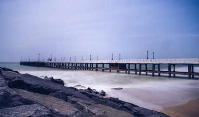 Wall Mural - Old pier at Promenade Beach. Rock Beach is the popular stretch of beachfront in the city of Puducherry, India, along the Bay of Bengal