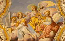 OSSUCCIO, ITALY - MAY 8, 2015: The Baroque Fresco Choir Of Angels With The Music Instruments In Church Sacro Monte Della Beata Vergine Del Soccorso By Salvatore Pozzi Di Puria  (1595 â€“ 1681).