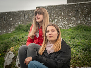 Two girls on their journey in Ireland visit the famous Rock of Cashel - travel photography