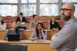 © Nejron Photo - Multinational group of students in an auditorium