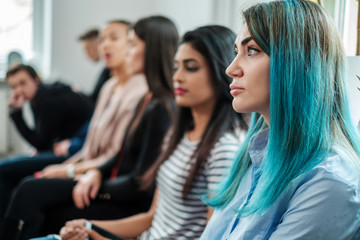 Group of young people waiting for a casting or job interview