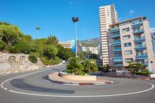 Monte Carlo Street Curve With Formula One Red And White Signs In A Sunny Summer Day In Monte Carlo, Monaco