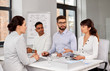 © Syda Productions - new job, hiring and employment concept - international team of recruiters having interview with female employee at office