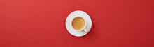 Top View Of White Cup With Fresh Coffee On Saucer On Red Background, Panoramic Shot