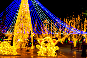 Wall Mural - Blurred and bokeh of Christmas holiday lighting