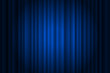 © Azat Valeev - Closed silky luxury blue curtain stage background spotlight beam illuminated. Theatrical drapes. Vector gradient illustration