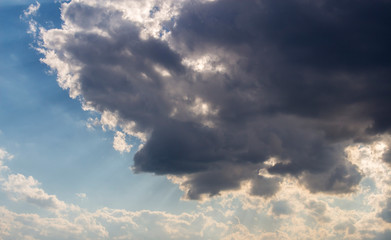 Cumulus clouds, dramatic sky.