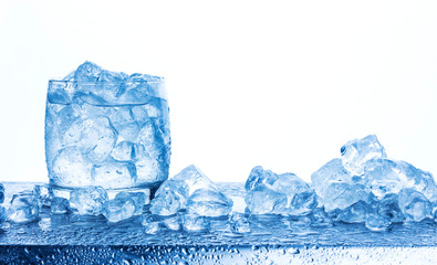 Wall Mural - water with crushed ice cubes in glass isolated on white background