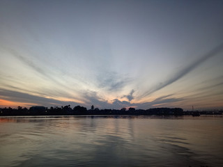 Wall Mural - the sky when the sun will rise in the river